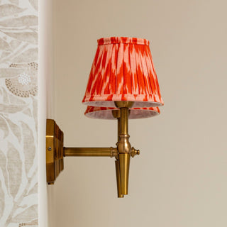 Double Brass Wall Light | Orange Pleated Shade in Lighting from Oriana B www.orianab.com