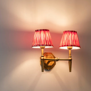 Double Brass Wall Light | Orange Pleated Shade in Lighting from Oriana B www.orianab.com