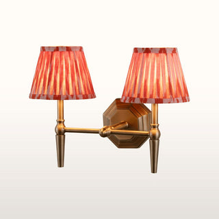 Double Brass Wall Light | Orange Pleated Shade in Lighting from Oriana B www.orianab.com