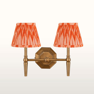 Double Brass Wall Light | Orange Pleated Shade in Lighting from Oriana B www.orianab.com