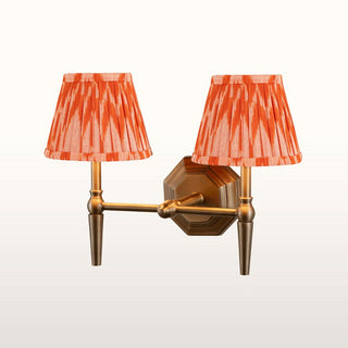 Double Brass Wall Light | Orange Pleated Shade in Lighting from Oriana B www.orianab.com