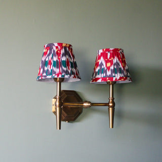 Double Brass Wall Light | Red & Blue Pleated Shade in Lighting from Oriana B www.orianab.com