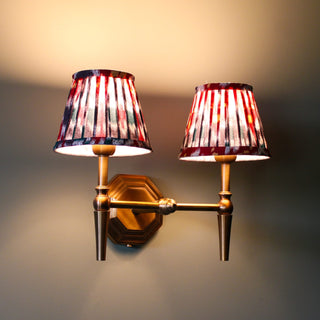 Double Brass Wall Light | Red & Blue Pleated Shade in Lighting from Oriana B www.orianab.com