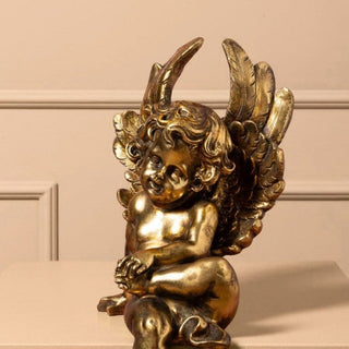 Golden Seated Cherub in Christmas from Oriana B www.orianab.com