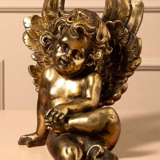 Golden Seated Cherub in Christmas from Oriana B www.orianab.com