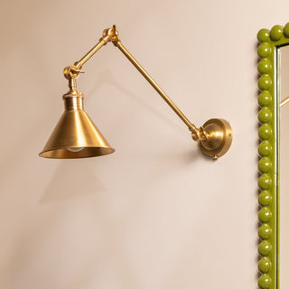 Long Arm Cone Wall Light | Brass in Lighting from Oriana B www.orianab.com