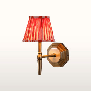 Single Brass Wall Light | Orange Pleated Shade in Lighting from Oriana B www.orianab.com